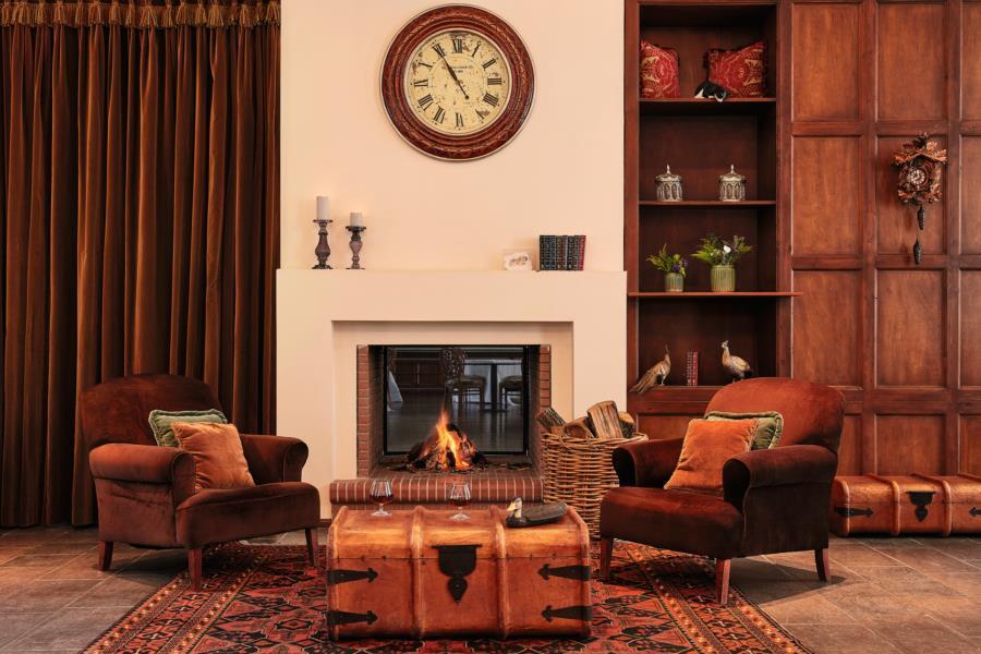 Grecotel Astir Palace Aleksandropolis Zewnętrze zdjęcie A living room with a fireplace